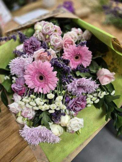 Pink Haze Wrap - A beautiful floral wrap in soft pinks and purples with fresh white accents, creating a pretty and softly textured display.