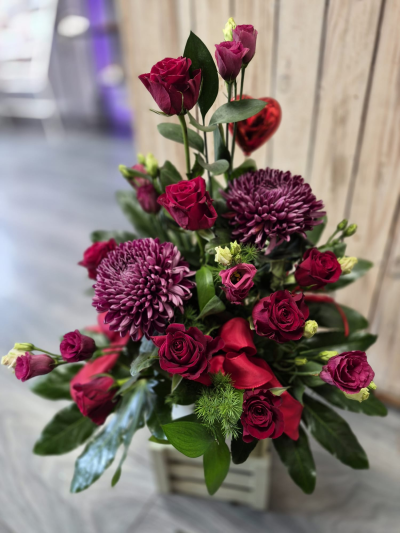 Love Struck - A striking arrangement in deep red and purple tones, designed to make a romantic statement.
