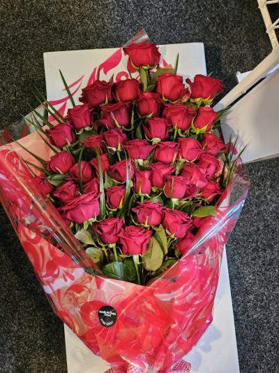 Forever Yours - A luxurious bouquet of classic red roses, perfect for making a truly romantic gesture.