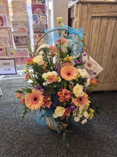 Summer Breeze - A bright and colourful basket arrangement designed to make someone’s day.