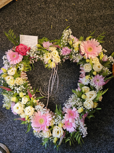Blushing Heart Tribute - A beautiful open-heart tribute in soft pink and cream tones, created with care to honour a loved one.
