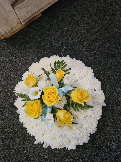 Gentle Goodbye - A classic tribute in white and yellow, offering a thoughtful expression of love.