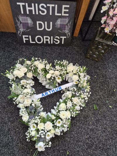 Forever Remembered Wreath - A classic white open wreath, suitable for personalisation with the name of your loved one.