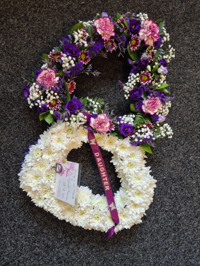 Double Heart - A personalised funeral tribute in rich purple and white, created in memory of a loved one.