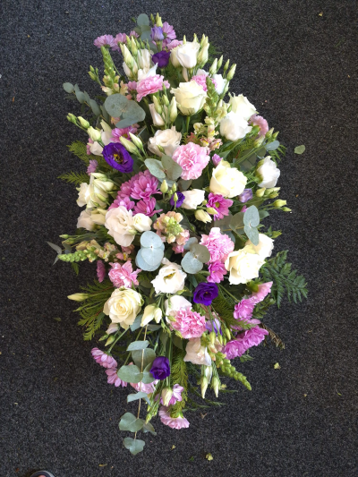 Tender Memories Casket Spray - A graceful casket spray in soft pink, purple and white, created with care and sensitivity.